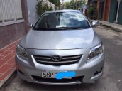 Cần bán xe Toyota Corolla altis đời 2010, màu bạc đã đi 70000 km