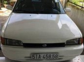 Cần bán Mazda 323 đời 2003, màu trắng đã đi 140000 km