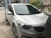 Cần bán lại xe Kia K3 đời 2014, màu bạc, giá chỉ 562 triệu