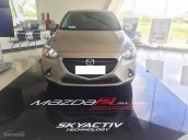 Cần bán xe Mazda 2 sản xuất 2015, màu vàng