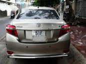 Gia đình bán xe Toyota Vios đời 2016, màu vàng