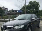 Cần bán Mazda 323 đời 2002, màu đen