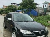 Cần bán Mazda 323 đời 2002, màu đen