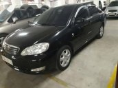 Bán xe cũ Toyota Corolla 1.8 đời 2005, màu đen còn mới, giá 390tr