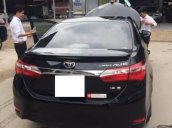 Cần bán gấp Toyota Corolla Altis G 1.8MT đời 2016, màu đen số sàn, giá 632tr