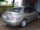 Bán Mitsubishi Lancer AT sản xuất 2003, màu vàng