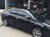 Cần bán gấp Toyota Corolla Altis G 1.8MT đời 2016, màu đen số sàn, giá 632tr