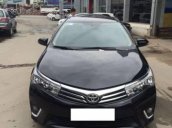 Cần bán gấp Toyota Corolla Altis G 1.8MT đời 2016, màu đen số sàn, giá 632tr