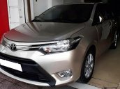 Bán Toyota Vios E đời 2015, màu vàng chính chủ