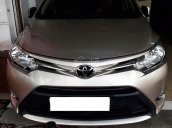 Bán Toyota Vios E đời 2015, màu vàng chính chủ