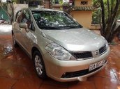 Bán ô tô Nissan Tiida 1.4MT đời 2007, màu vàng, xe nhập số sàn