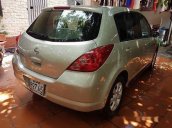 Bán ô tô Nissan Tiida 1.4MT đời 2007, màu vàng, xe nhập số sàn