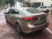 Auto bán Kia Cerato Signature 1.6 AT đời 2017, màu vàng số tự động