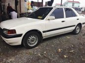 Bán xe Mazda 323 đời 1995, màu trắng, nhập khẩu nguyên chiếc, giá tốt