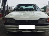 Bán xe Mazda 323 đời 1995, màu trắng, nhập khẩu nguyên chiếc, giá tốt
