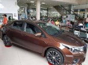 Cần bán xe Toyota Corolla Altis đời 2017, màu nâu