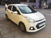 Bán xe Hyundai Grand i10 đời 2015, màu trắng, xe nhập số sàn