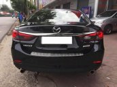 Cần bán gấp Mazda 6 2.5AT sản xuất 2015, màu đen số tự động giá cạnh tranh