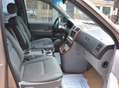 Cần bán Kia Carnival AT đời 2009, màu nâu số tự động, 289 triệu