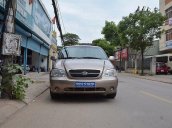 Cần bán Kia Carnival AT đời 2009, màu nâu số tự động, 289 triệu