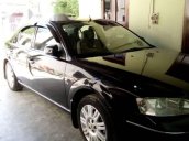 Cần bán gấp Ford Mondeo đời 2004, màu đen xe gia đình