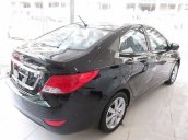 Cần bán xe Hyundai Accent 1.4AT đời 2017, màu đen