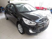 Cần bán xe Hyundai Accent 1.4AT đời 2017, màu đen