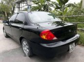 Bán xe Kia Spectra đời 2004, màu đen, giá 130tr