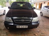 Bán ô tô Kia Carnival đời 2008, màu đen, số sàn