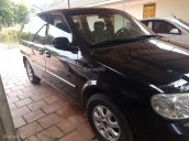 Bán ô tô Kia Carnival đời 2008, màu đen, số sàn