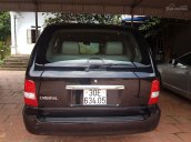 Bán ô tô Kia Carnival đời 2008, màu đen, số sàn