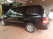 Bán ô tô Kia Carnival đời 2008, màu đen, số sàn