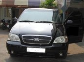 Bán ô tô Kia Carnival đời 2009, màu đen số tự động