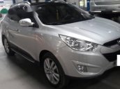 Cần bán lại xe Hyundai Tucson 2.0AT đời 2010, màu trắng, xe nhập số tự động, 576tr