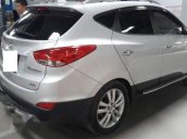 Cần bán lại xe Hyundai Tucson 2.0AT đời 2010, màu trắng, xe nhập số tự động, 576tr