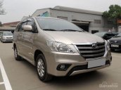 Nhà cần bán xe Innova G 2014 màu vàng, số tự động xe đẹp nguyên zin