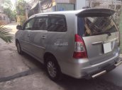 Cần bán xe Toyota Innova 2014 số sàn, màu bạc, zin nguyên bản không lỗi