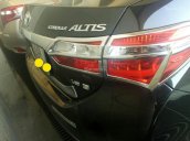 Cần bán xe Toyota Corolla Altis đời 2016, màu đen