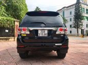 Cần bán Toyota Fortuner 2.7V đời 2014, màu đen chính chủ