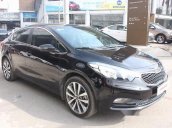 Bán xe Kia K3 1.6MT sản xuất 2015, màu đen số sàn, giá chỉ 495 triệu