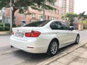 Bán BMW 3 Series 320i năm 2013, màu trắng, giá chỉ 929 triệu