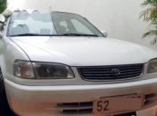 Cần bán Toyota Corolla GLI 1.6 đời 1999, màu trắng, nhập khẩu
