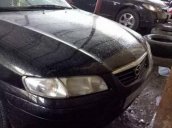 Cần bán xe Mazda 626 đời 2001, màu đen