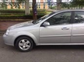 Bán lại xe Daewoo Lacetti EX đời 2011, màu bạc chính chủ