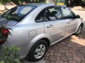 Bán xe Daewoo Lacetti EX sản xuất 2011, màu bạc số sàn