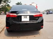 Cần bán lại xe Toyota Corolla altis 1.8G AT đời 2014, màu đen, giá 715tr