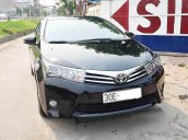 Cần bán lại xe Toyota Corolla altis 1.8G AT đời 2014, màu đen, giá 715tr