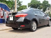 Cần bán lại xe Toyota Corolla altis 1.8G AT đời 2014, màu đen, giá 715tr