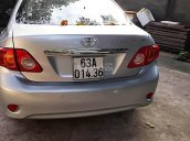 Cần bán Toyota Corolla Altis 1.8G MT đời 2009, màu bạc số sàn, 430tr