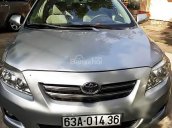 Cần bán Toyota Corolla Altis 1.8G MT đời 2009, màu bạc số sàn, 430tr